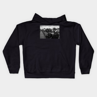 Small steam locomotive coming in to the station Kids Hoodie